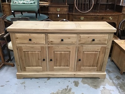 Lot 873 - Light oak sideboard with three drawers and cupboards below