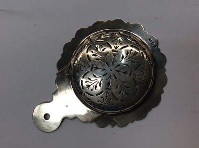 Lot 679 - Silver tea strainer