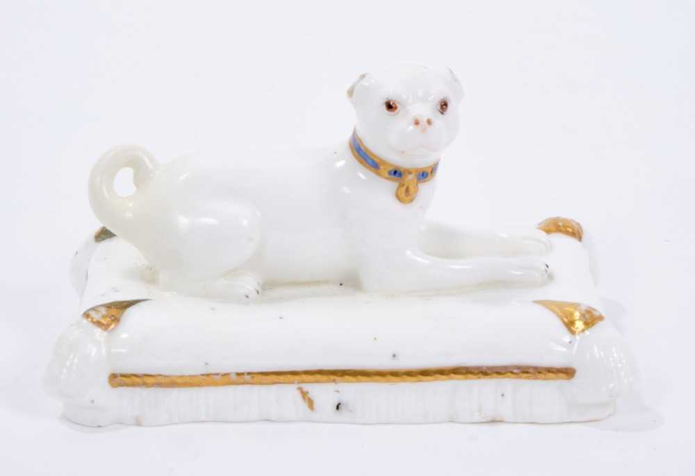 Lot 68 - Minton model of a pug, circa 1831-40.  Provenance Dennis G Rice Collection. Illustrated: Dennis G Rice, Dogs in English Porcelain of the 19th century, colour plate
