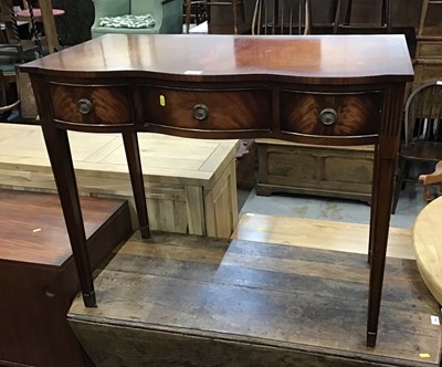 Lot 890 - Reproduction mahogany serpentine fronted side table with three drawers