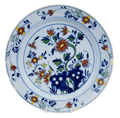 Lot 78 - 18th century English Delft polychrome charger