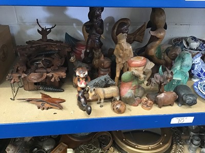 Lot 219 - Collection of carved wooden figures and ornaments, and a Black Forest clock