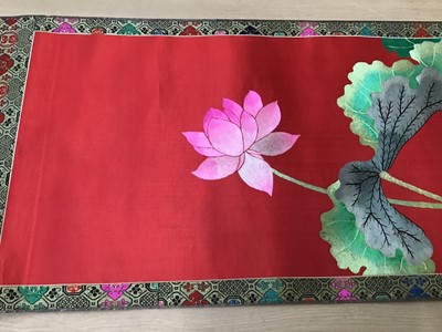 Lot 1774 - Large Chinese embroidered red silk wall hanging. Polychrome silk thread embroidered lotus flowers, water lilies and a pair of Mardarin ducks on a pond. Brocade borders