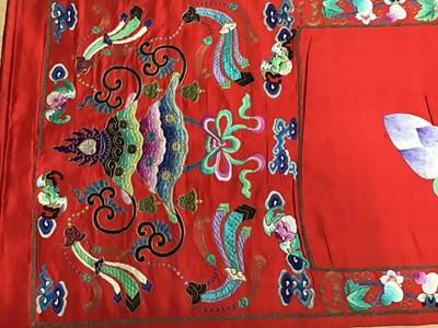 Lot 1776 - Large Chinese embroidered red silk wall hanging. Polychrome silk thread and metallic embroidered white crane, insects, symbols, bats and flowers . Pink cotton backing and wood baton for handing. 29...