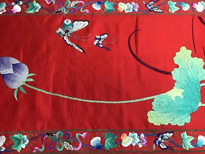 Lot 1776 - Large Chinese embroidered red silk wall hanging. Polychrome silk thread and metallic embroidered white crane, insects, symbols, bats and flowers . Pink cotton backing and wood baton for handing. 29...