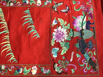 Lot 1776 - Large Chinese embroidered red silk wall hanging. Polychrome silk thread and metallic embroidered white crane, insects, symbols, bats and flowers . Pink cotton backing and wood baton for handing. 29...