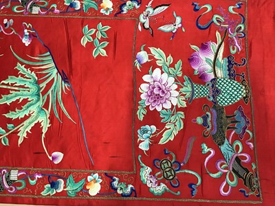 Lot 1777 - Large Chinese embroidered red silk wall hanging. Polychrome silk thread embroidered colourful cockerel, lotus flowers, other flowers, insects, clouds and symbols. Pink cotton backing and wood rod f...