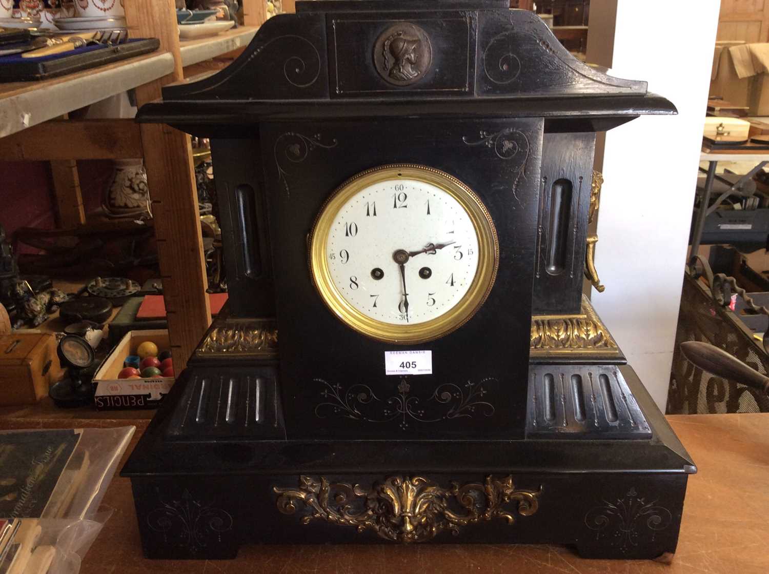 Lot 405 - Late 19th century mantel clock in black slate case