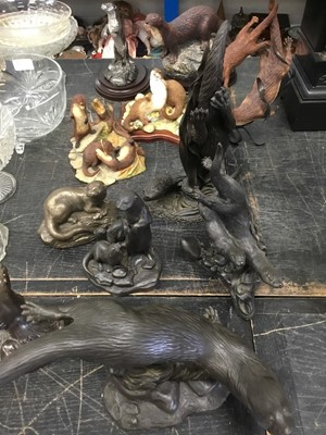Lot 173 - Group of otter resin sculptures together with other otter sculptures