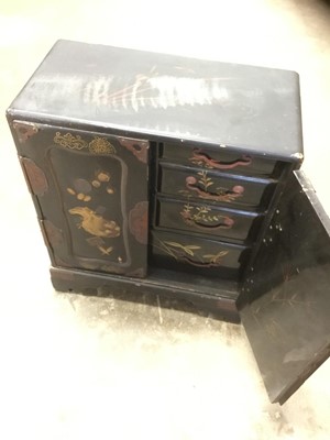 Lot 179 - Japanese lacquered table cabinet