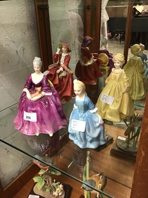 Lot 206 - Four Royal Doulton figurines, including Charlotte, Grandmother's Dress, Top o' the Hill, and A Child from Williamsburg