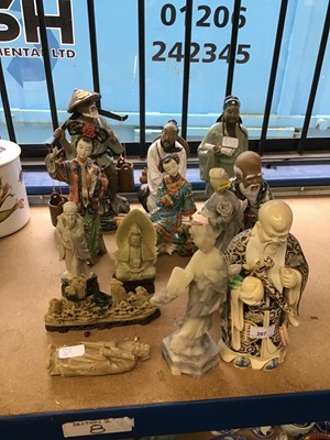 Lot 207 - Collection of oriental figures, including ceramic and hardstone examples