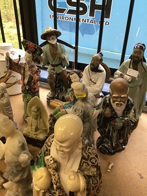 Lot 207 - Collection of oriental figures, including ceramic and hardstone examples