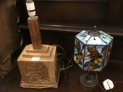 Lot 185 - Carved wooden lamp and a Tiffany style lamp