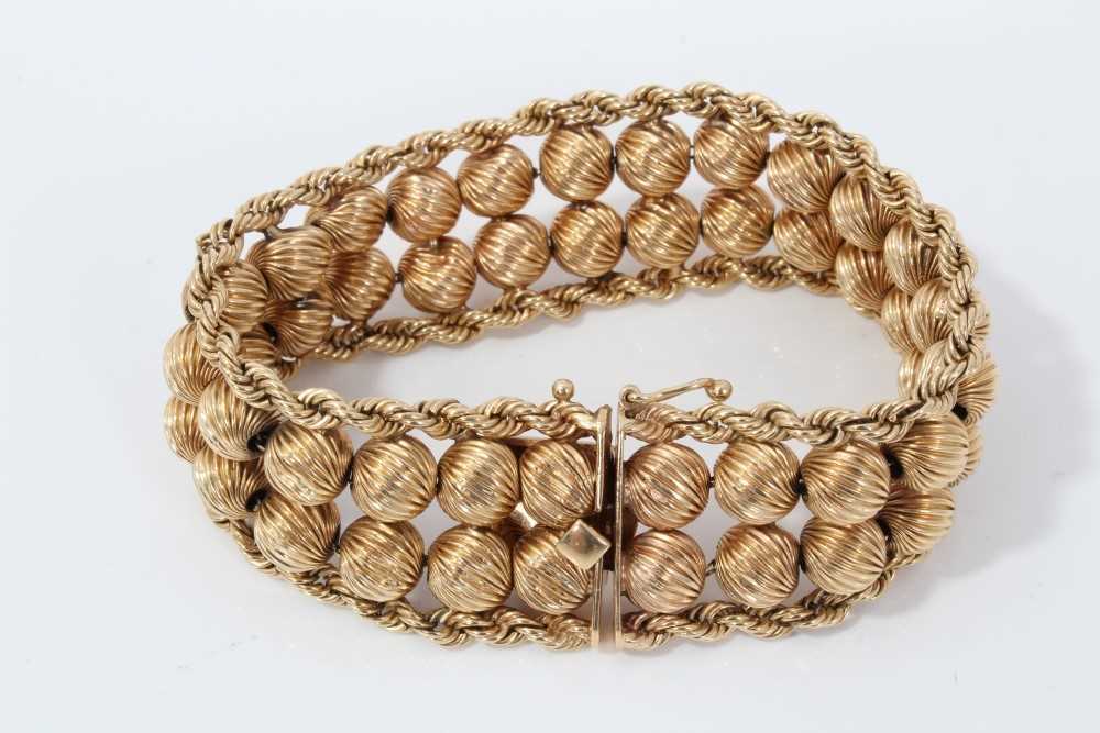 Lot 17 - 14ct gold bracelet with fancy spiral bead and rope twist links