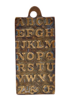 Lot 659 - Rare child's brass alphabet plaque signed St Paul's 1729