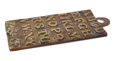 Lot 659 - Rare child's brass alphabet plaque signed St Paul's 1729