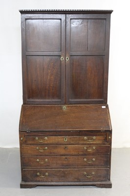 Lot 1215 - George III oak two height bureau bookcase