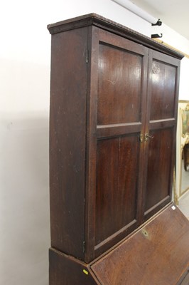 Lot 1215 - George III oak two height bureau bookcase