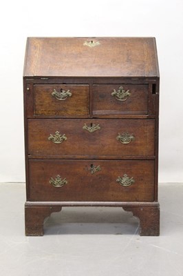 Lot 1219 - Small George III oak bureau