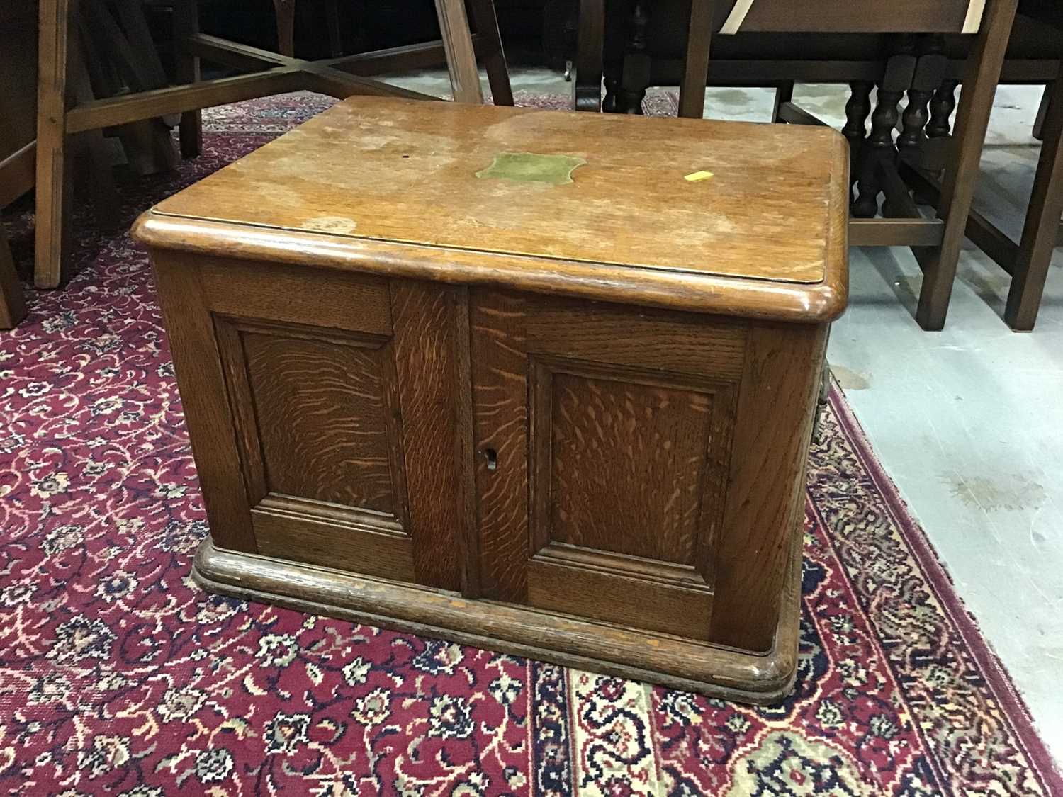 Lot 1034 - Edwardian oak cutlery cabinet with four drawers enclosed by two panelled doors