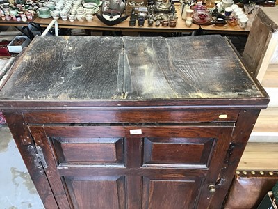 Lot 1048 - 18th century panelled oak cupboard enclosed by a single fielded panelled oak door (live woodworm to the top and back)