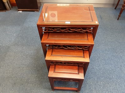 Lot 89 - Good quality Chinese hardwood nest of four tables
