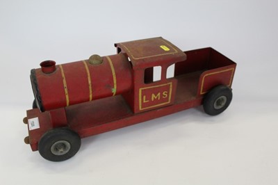 Lot 1520 - Tri-ang tin plate pull along train in LMS colours