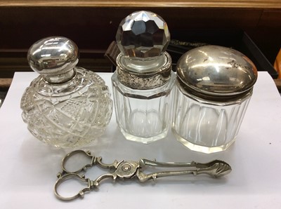 Lot 695 - Three silver mounted glass vanity jars and pair Georgian silver sugar tongs