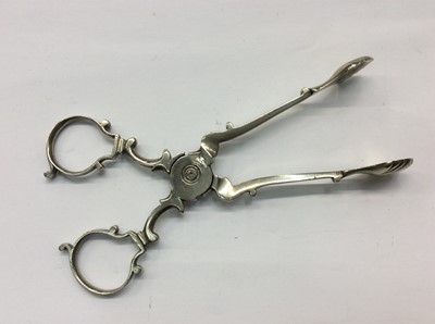 Lot 695 - Three silver mounted glass vanity jars and pair Georgian silver sugar tongs