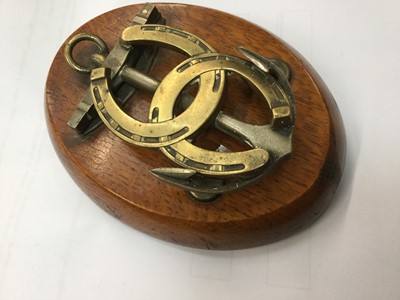 Lot 299 - Victorian brass and oak letter clip in the form of an anchor and horseshoe