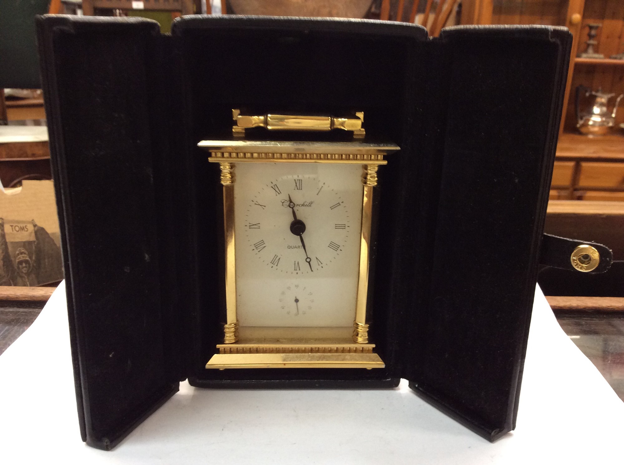 Lot 310 Churchill Quartz carriage clock in case