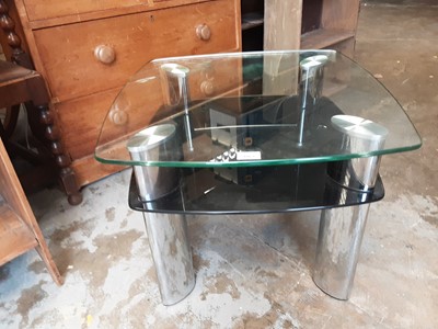 Lot 1063 - Contemporary chrome and glass two tier coffee table