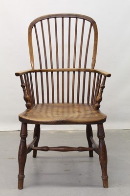 Lot 1244 - 19th century windsor elm elbow chair with hoop back