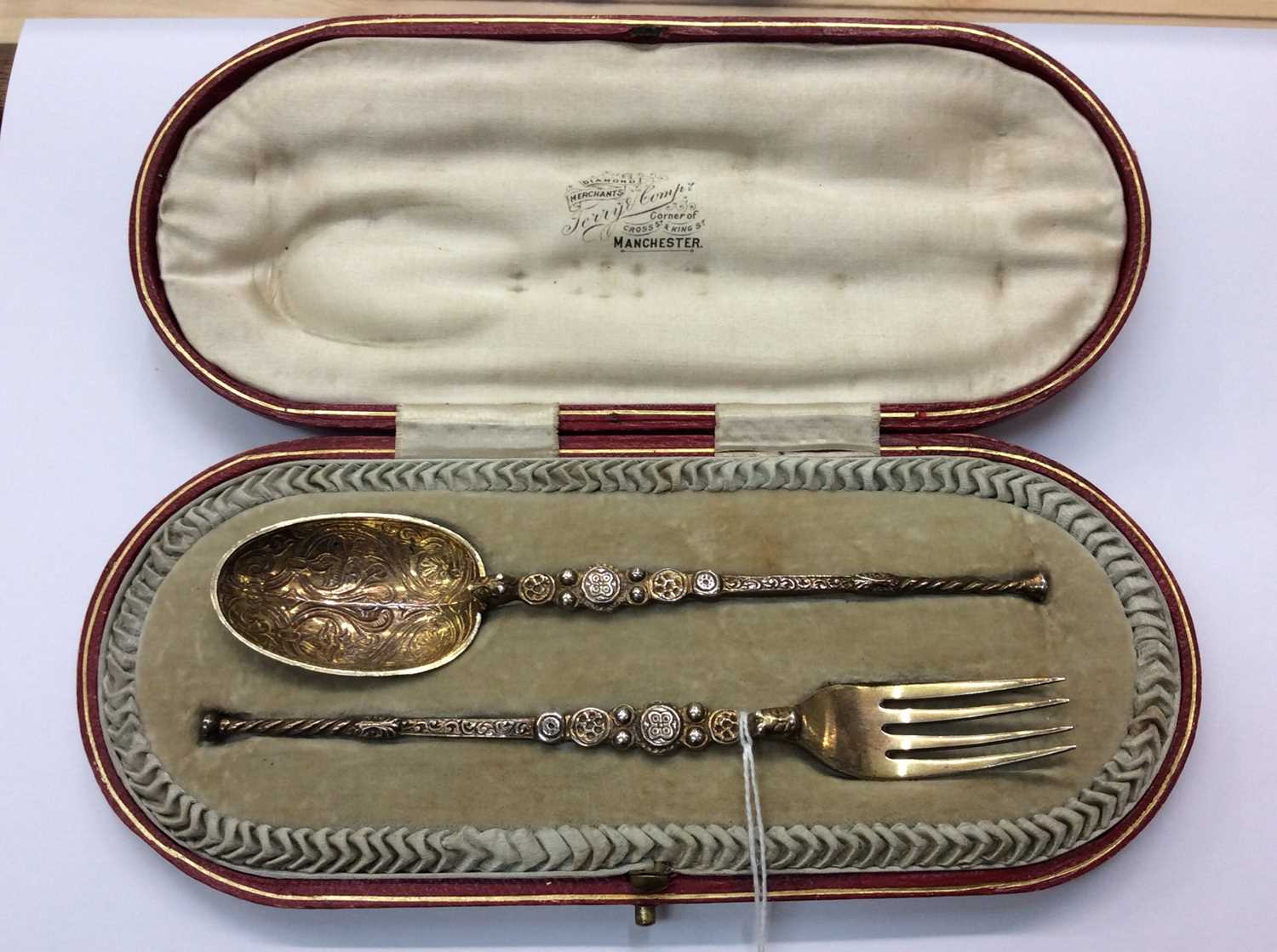 Lot 651 Silver gilt spoon and fork set in fitted
