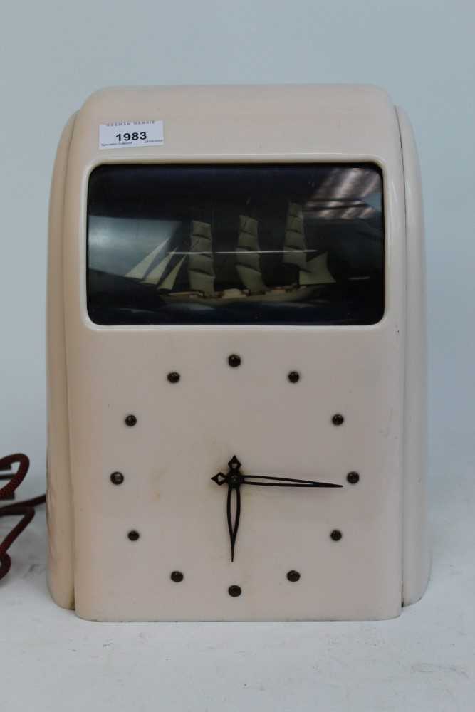 Lot 1983 - Vintage Vitascope pink Bakelite electric clock with ship automaton