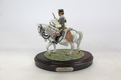 Lot 1407 - Impressive The Stadden Edition cast lead military figure group by Charles C. Stadden, Peninsula Regimental Drum Horse The Queen's Own Hussars, on oval wooden plinth, approx 18cm in height