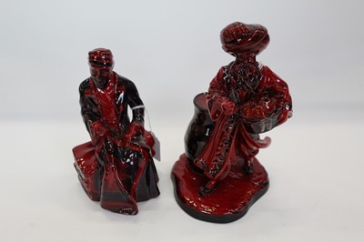 Lot 933 - Two Royal Doulton Flambe figures - The Lamp Seller HN3278 The Carpet Seller HN3277