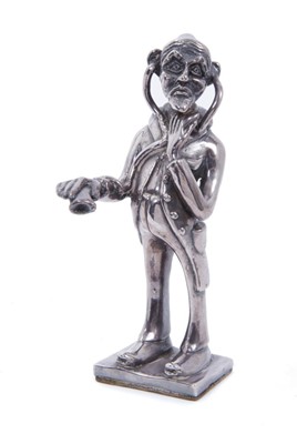 Lot 312 - Continental Britannia silver model of a physician with a stethoscope.
