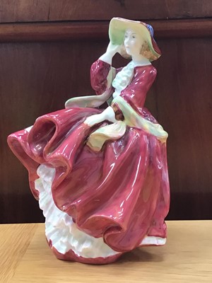 Lot 17 - Royal Doulton 'Top of the Hill' figure, together with other figures, fish plates and other china