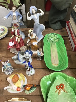Lot 17 - Royal Doulton 'Top of the Hill' figure, together with other figures, fish plates and other china