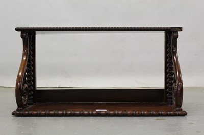 Lot 1246 - Early Victorian rosewood bookshelf with scroll supports