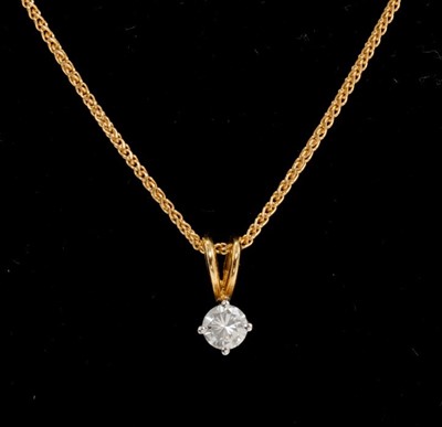 Lot 432 - Diamond single stone pendant on chain