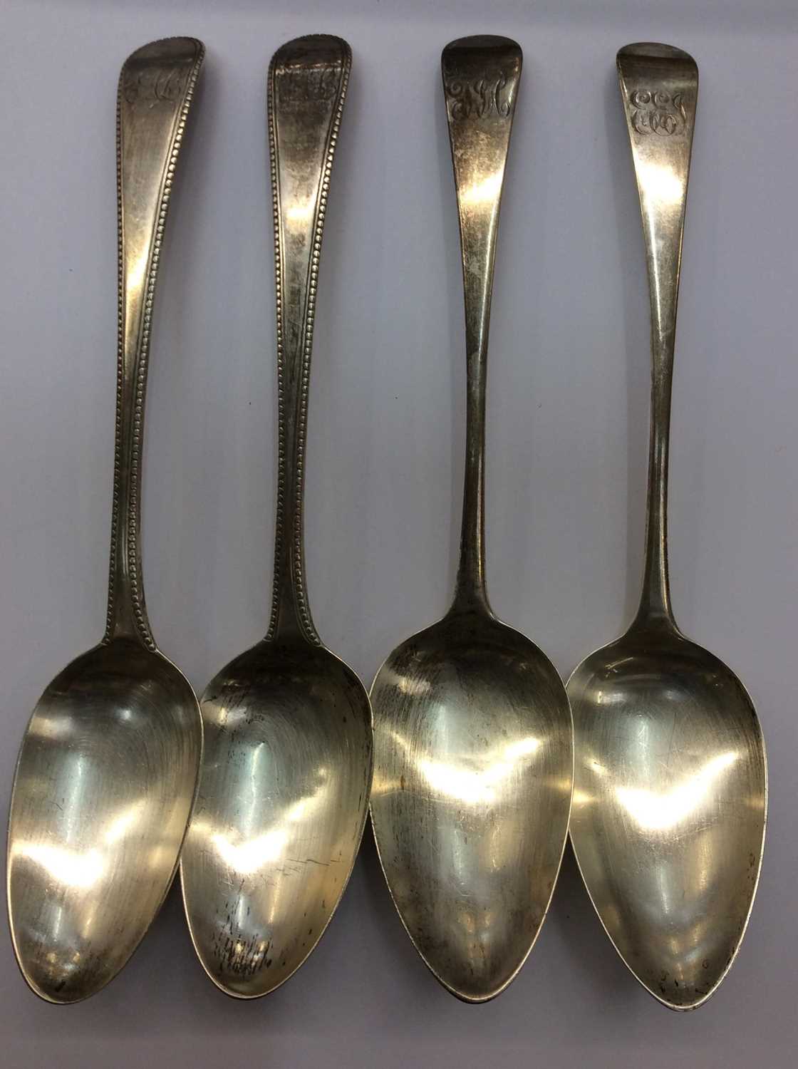 Lot 672 - Four Georgian silver tablespoons