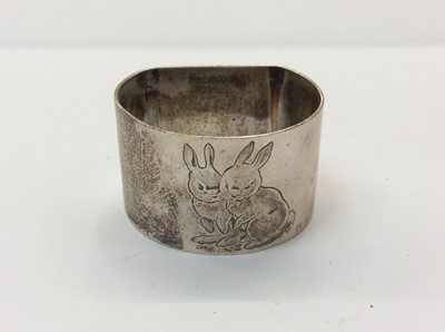 Lot 674 - Mappin & Webb silver napkin ring with engraved bunny decoration, in fitted case
