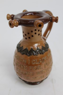 Lot 882 - Royal Doulton Stoneware puzzle jug