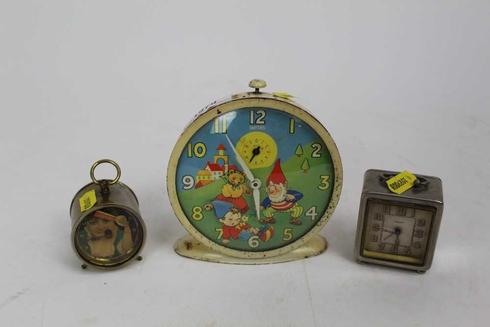 Lot 1970 - Two automaton clocks together with one other