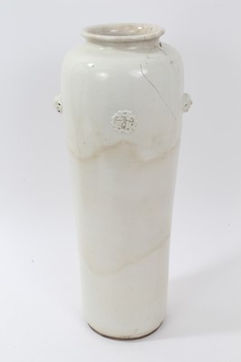 Lot 28 - Antique Chinese ceramics, including a large 17th/18th century Dehua blanc de chine cylindrical vase with moulded masks and roundels, 40.5cm height, a 19th century celadon ground vase, an 18th centu...