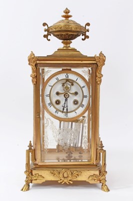 Lot 601 - Early 20th century four glass mantel clock