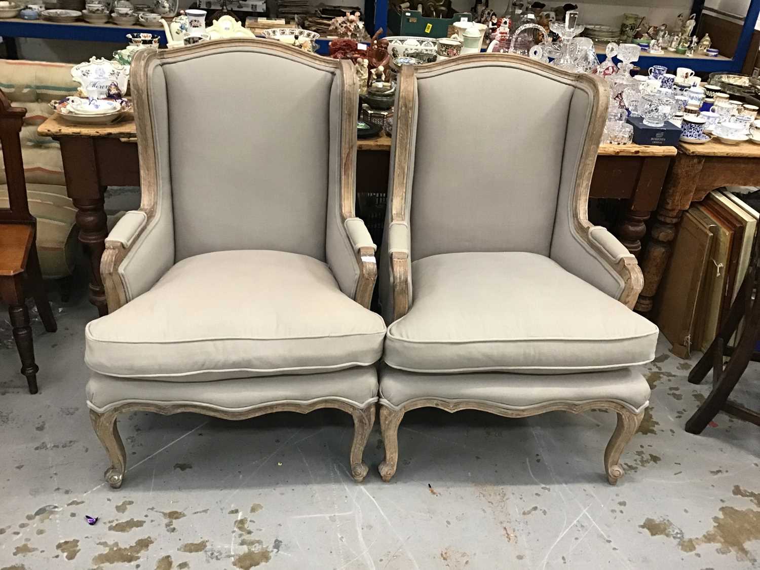 Lot 850 - Pair of contemporary arm chairs with show-wood frames, upholstered in grey fabric